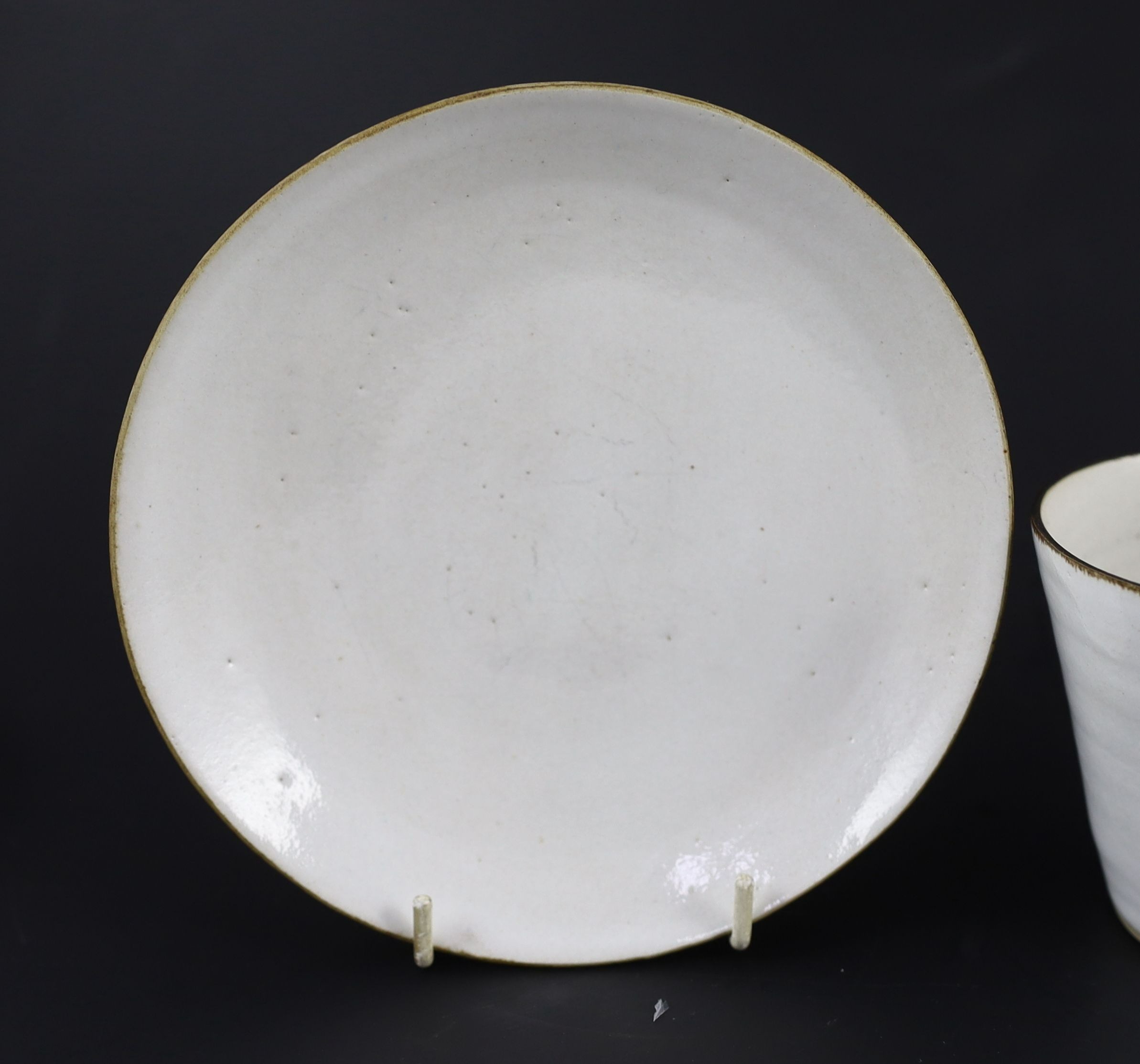 Dame Lucie Rie (1902-1995) a cup, saucer and side plate, c.1959, Cup 8 cm high